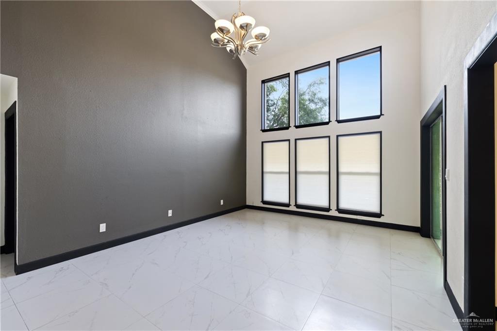 2018 Sabinal Street Mission, TX 78572 - Photo 4 of 20 a view of an empty room with a window