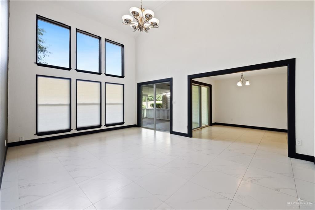 2018 Sabinal Street Mission, TX 78572 - Photo 6 of 20 a view of an empty room with windows