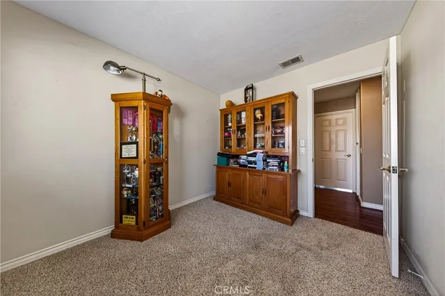 wooden floor and chair in a room