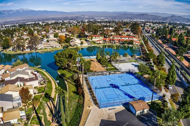an aerial view of a house with a lake view