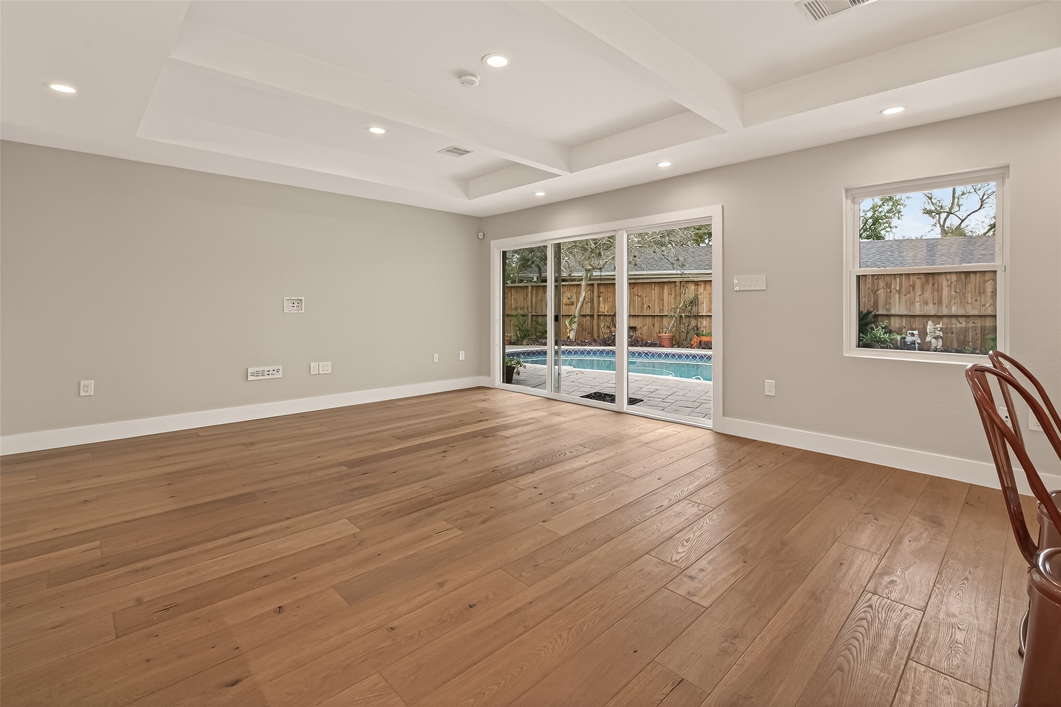 5310 Spellman Road Houston, TX 77096 - Photo 20 of 48 an empty room with wooden floor and windows