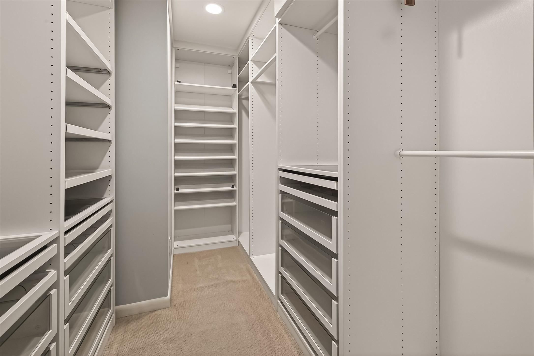 5310 Spellman Road Houston, TX 77096 - Photo 24 of 48 a view of walk in closet with empty racks