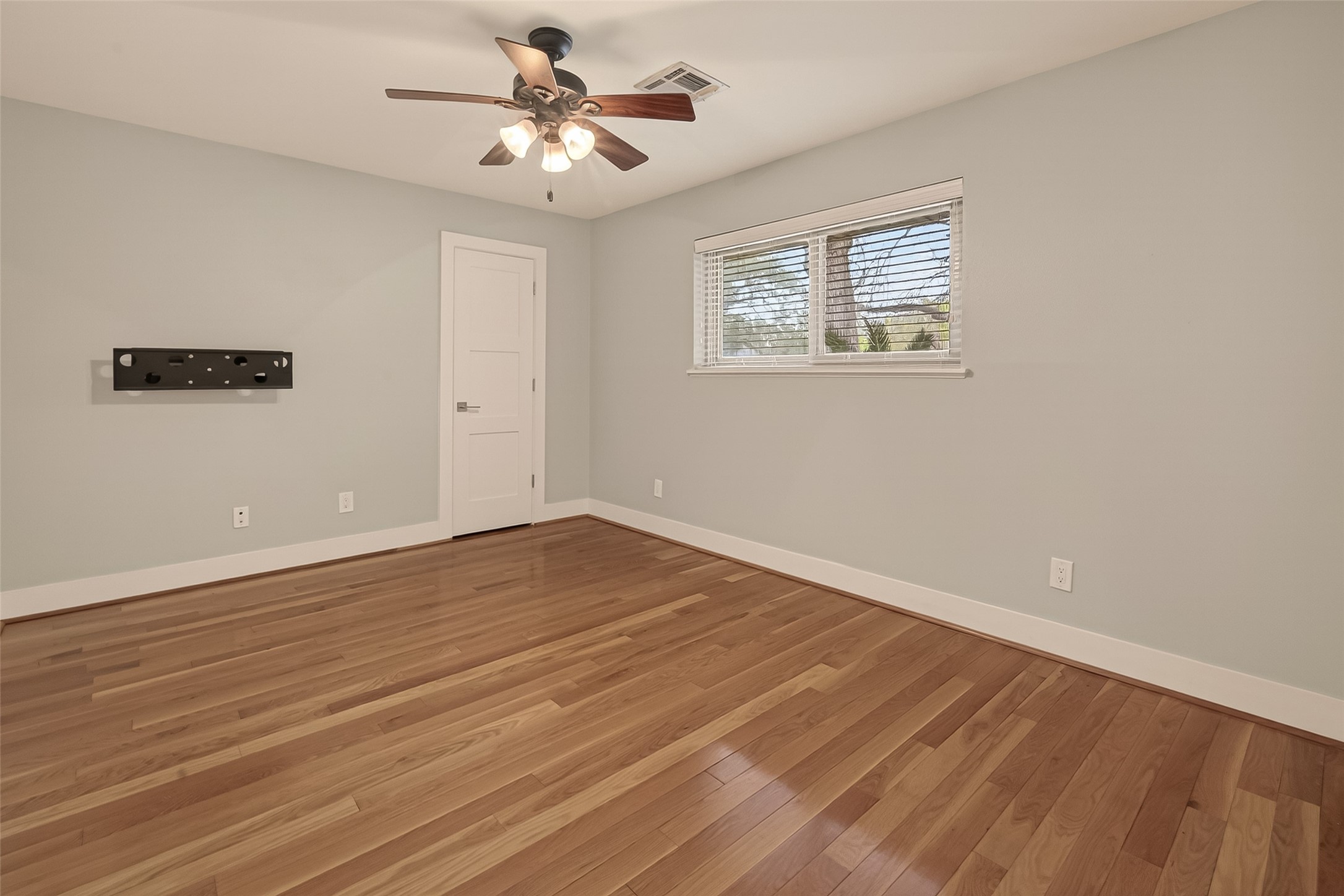 5310 Spellman Road Houston, TX 77096 - Photo 33 of 48 a view of empty room with wooden floor