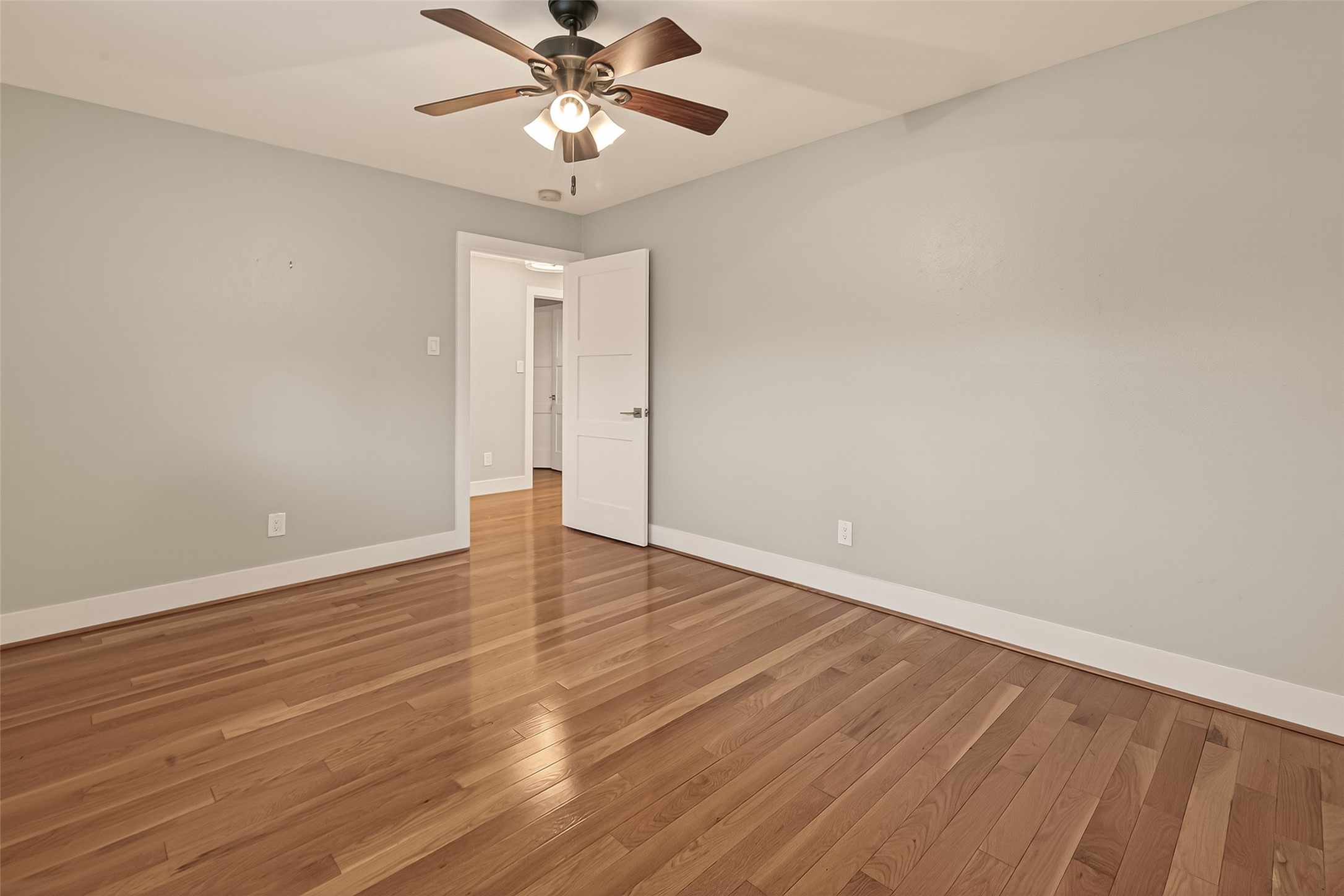 5310 Spellman Road Houston, TX 77096 - Photo 34 of 48 a view of an empty room with wooden floor