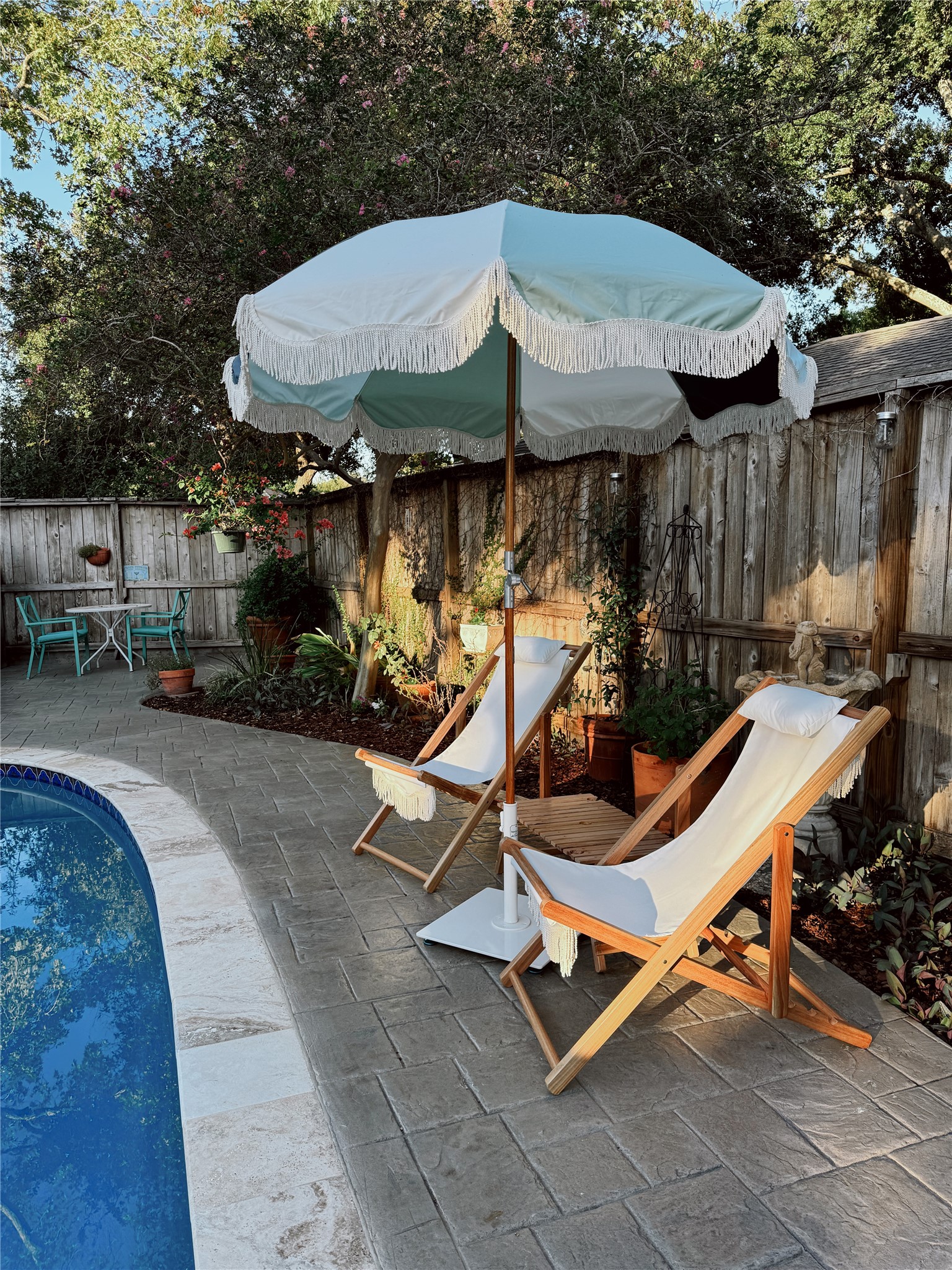 5310 Spellman Road Houston, TX 77096 - Photo 48 of 48 a view of a chairs and table in backyard