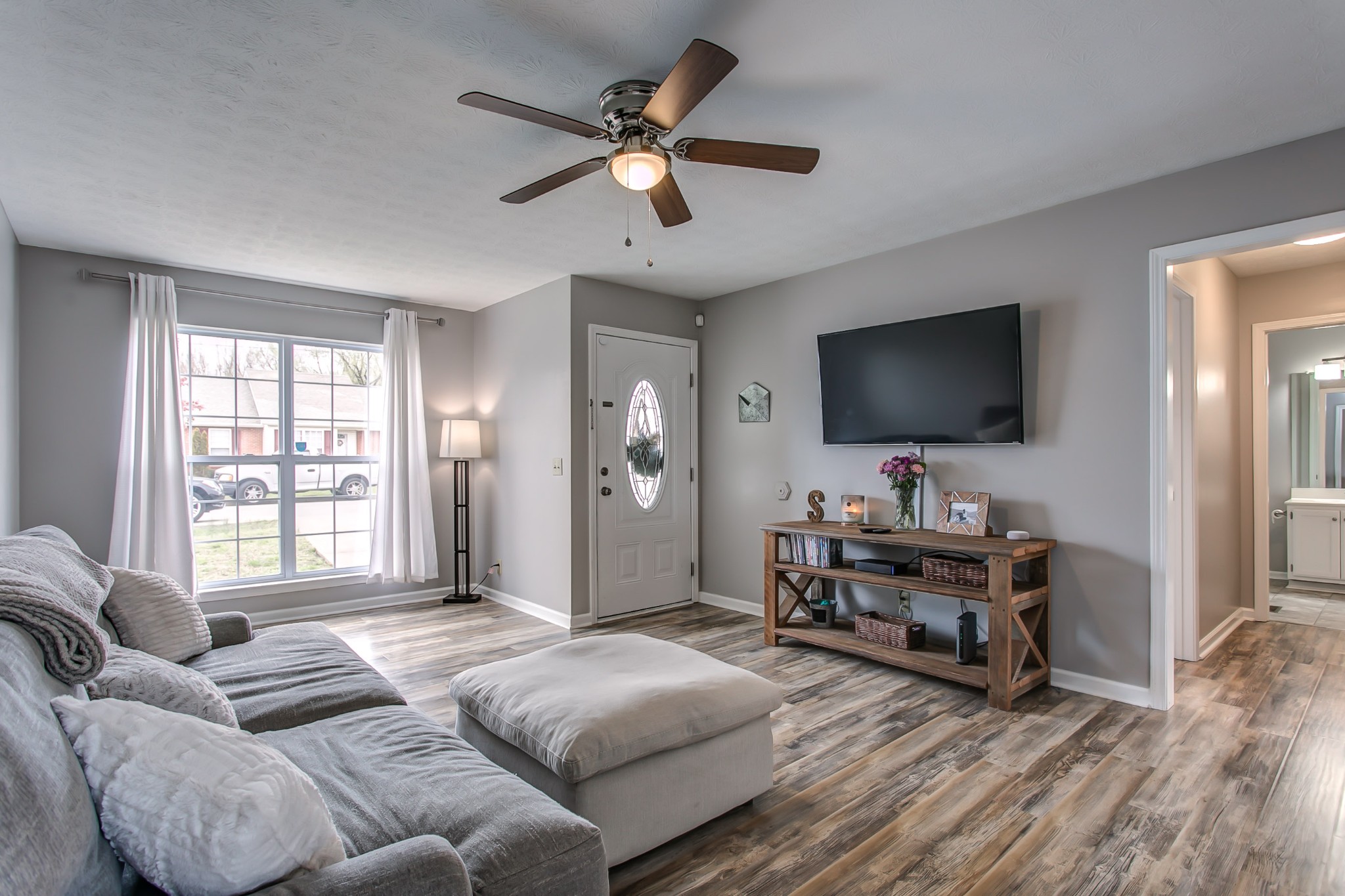 332 Bandera Lane Springfield, TN 37172 - Photo 2 of 22 a living room with furniture and a flat screen tv