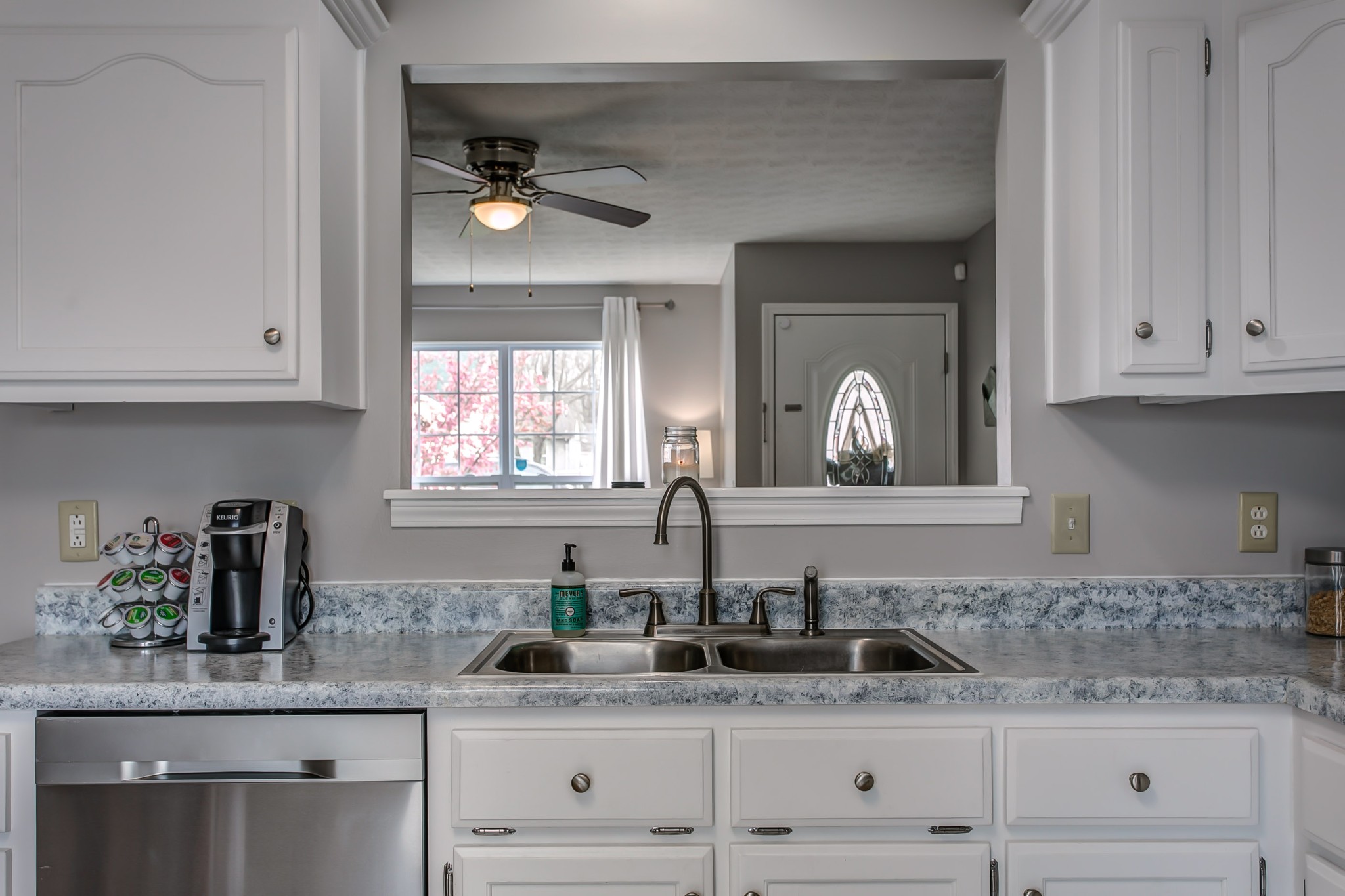 332 Bandera Lane Springfield, TN 37172 - Photo 6 of 22 a kitchen with granite countertop white cabinets and a window