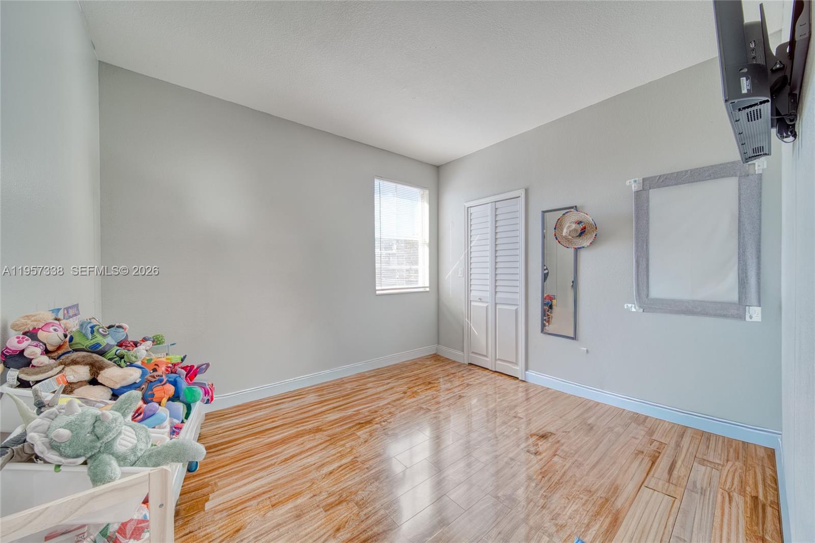 13771 Southwest 274th Terrace Homestead, FL 33032 - Photo 19 of 35 a view of livingroom with wooden floor
