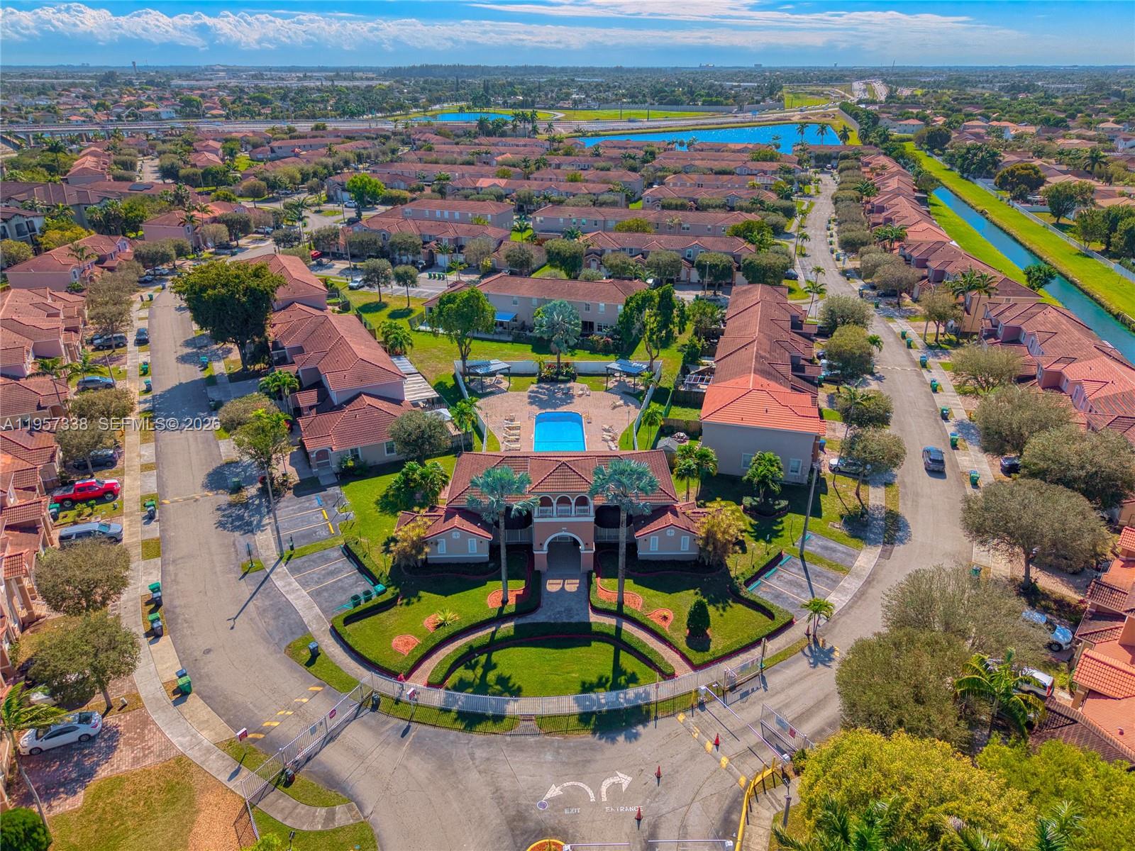 13771 Southwest 274th Terrace Homestead, FL 33032 - Photo 28 of 35 an aerial view of a swimming pool patio and mountain view