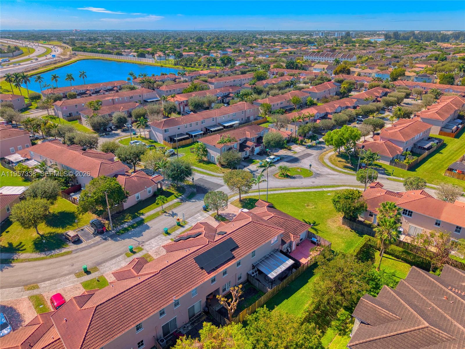 13771 Southwest 274th Terrace Homestead, FL 33032 - Photo 30 of 35 an aerial view of a houses with a swimming pool