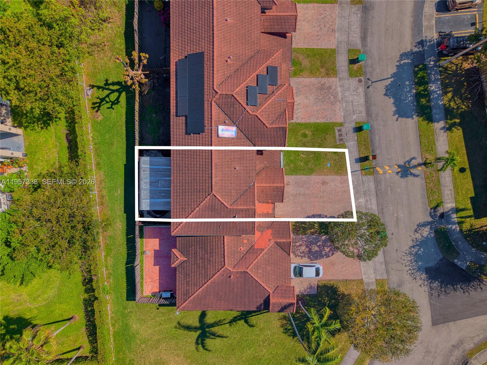 13771 Southwest 274th Terrace Homestead, FL 33032 - Photo 32 of 35 an aerial view of residential houses with outdoor space and trees
