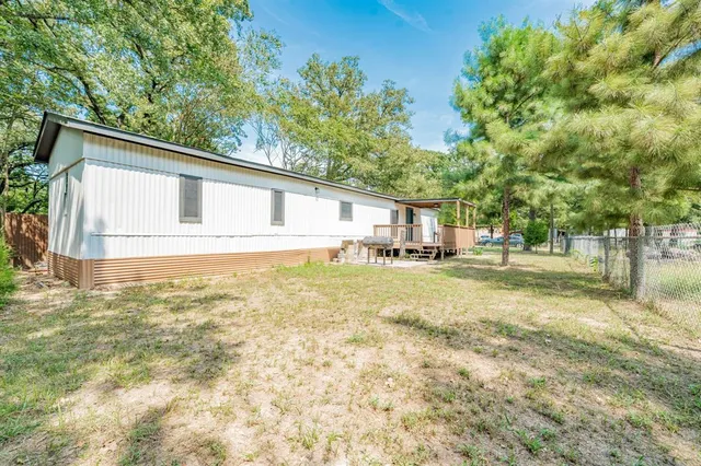 a front view of house with yard