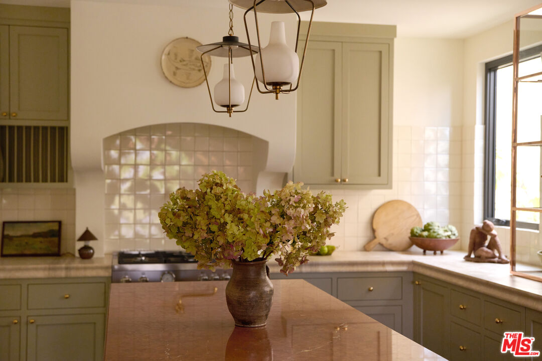 1764 East Orange Grove Boulevard Pasadena, CA 91104 - Photo 11 of 29 a bathroom with a sink and mirror with bathtub