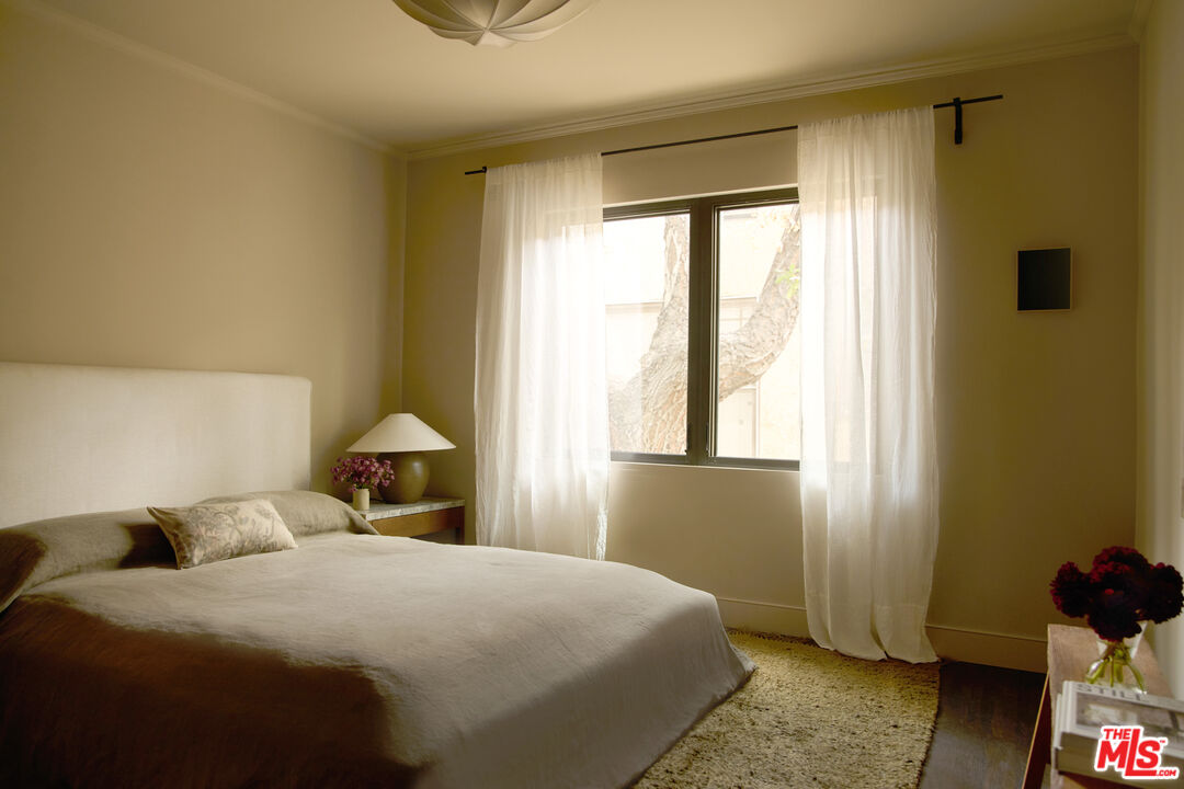 1764 East Orange Grove Boulevard Pasadena, CA 91104 - Photo 13 of 29 a bedroom with a bed and window