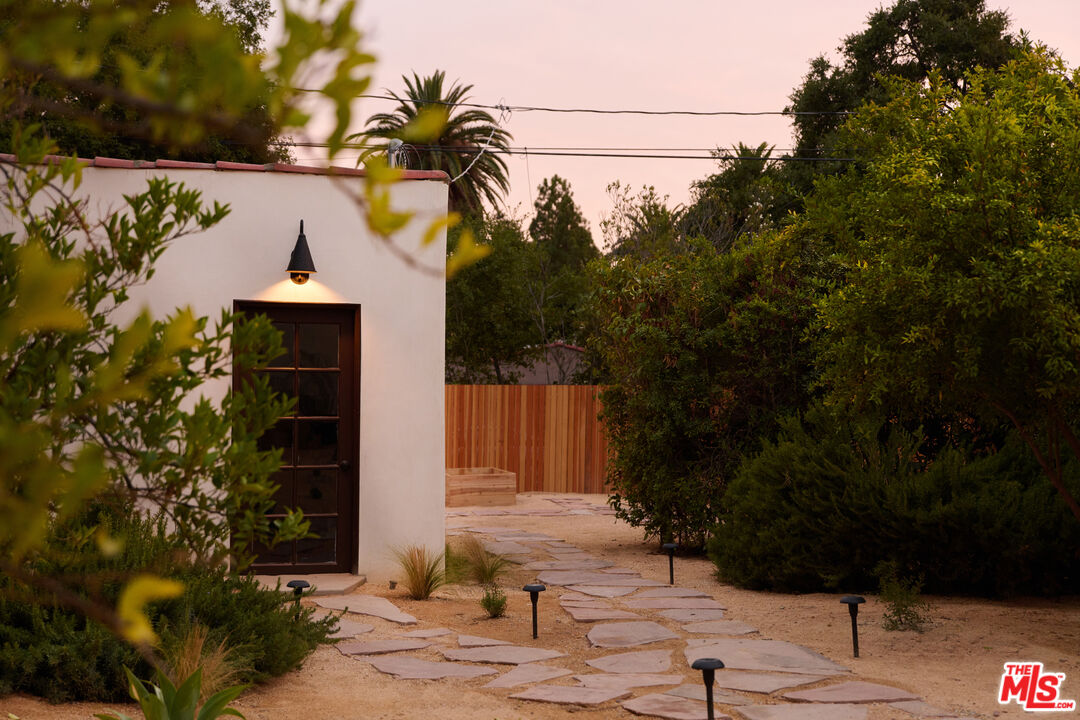 1764 East Orange Grove Boulevard Pasadena, CA 91104 - Photo 25 of 29 a front view of a house with garden