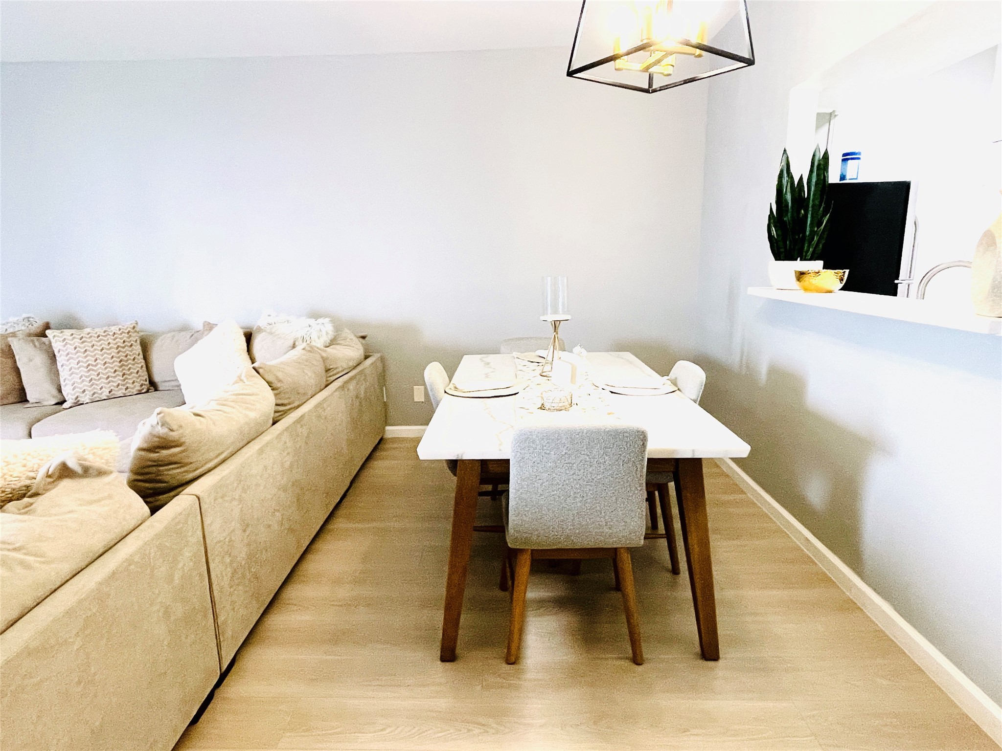 7284 Regency Square Court, Unit 7284 Houston, TX 77036 - Photo 4 of 19 a living room with furniture and a flat screen tv