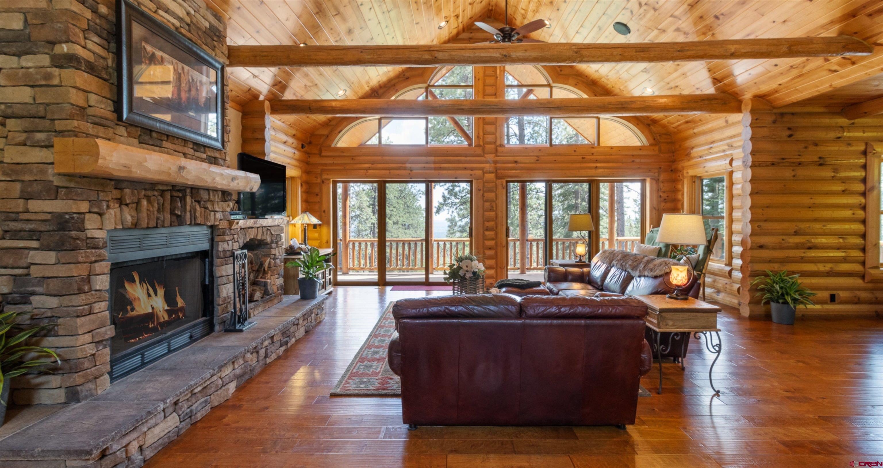 640 Clearview Road Durango, CO 81301 - Photo 11 of 40 a living room with furniture and a fireplace