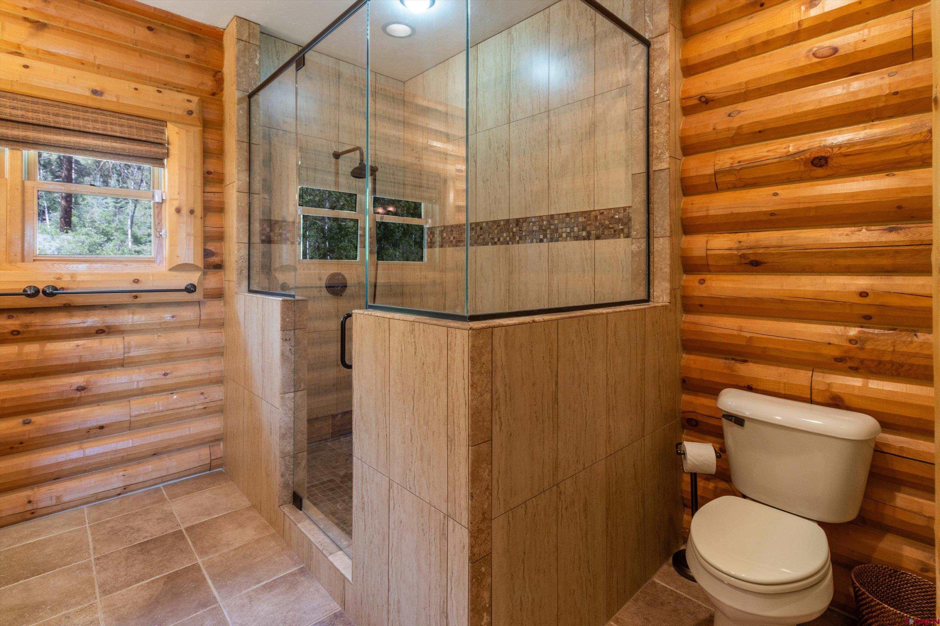 640 Clearview Road Durango, CO 81301 - Photo 16 of 40 a bathroom with a toilet and a shower