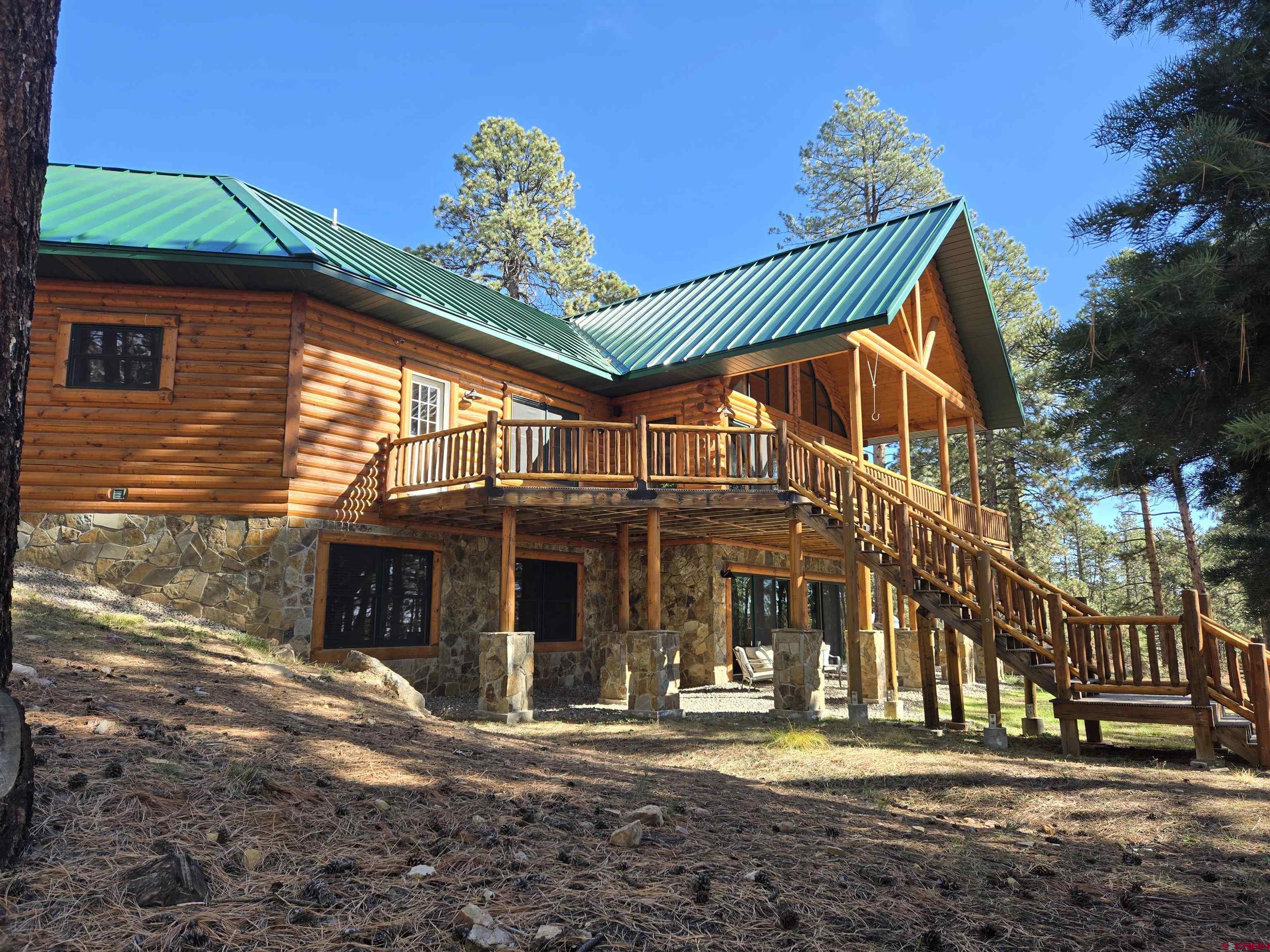 640 Clearview Road Durango, CO 81301 - Photo 36 of 40 a view of a house with a patio