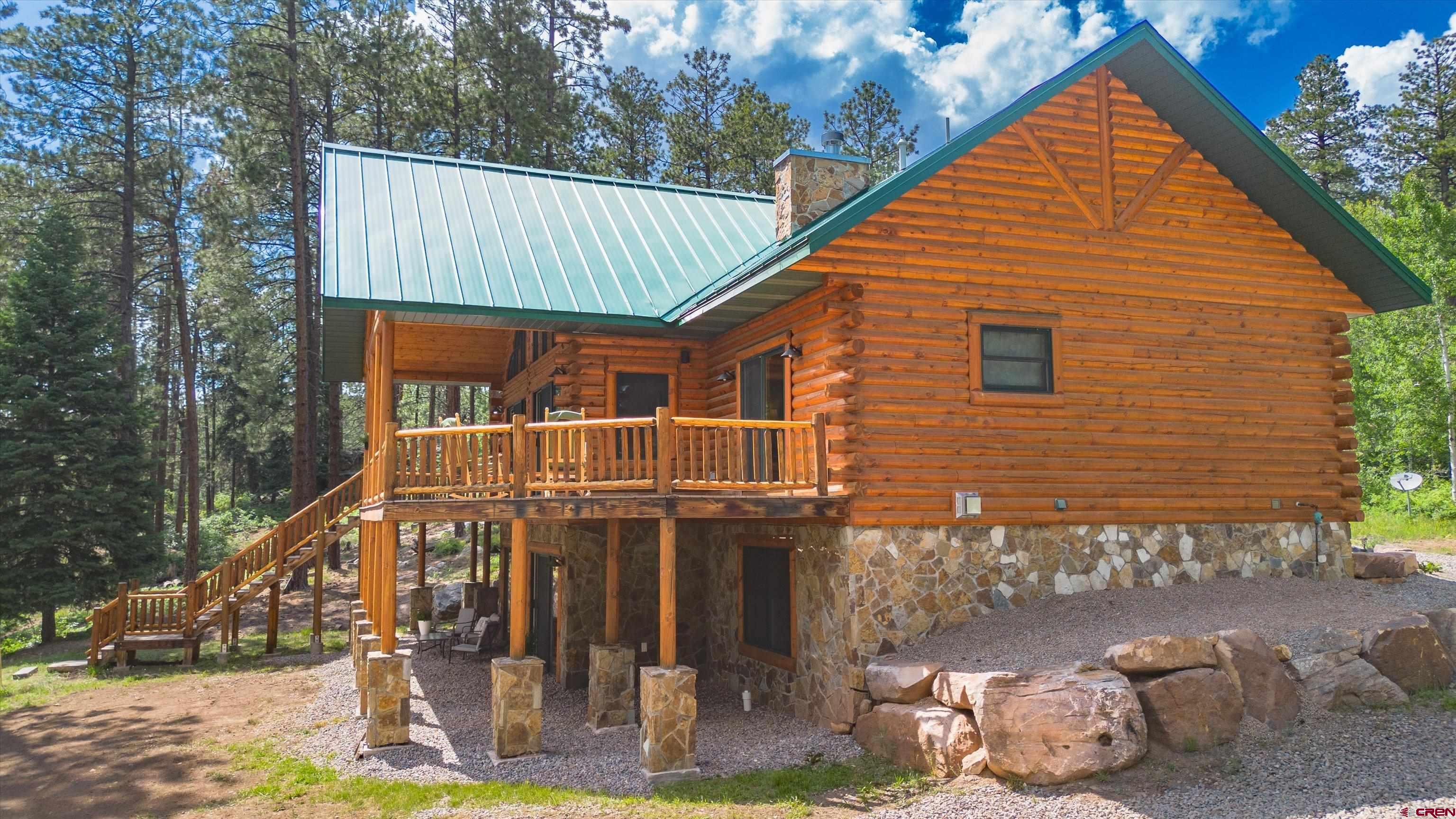 640 Clearview Road Durango, CO 81301 - Photo 37 of 40 a view of a house with backyard