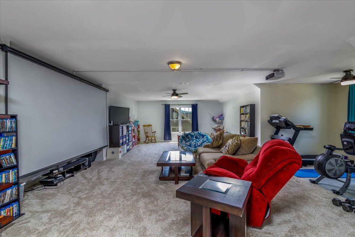 4277 Daugherty Road Salem, VA 24153 - Photo 28 of 48 a living room with furniture a air conditioner and a window