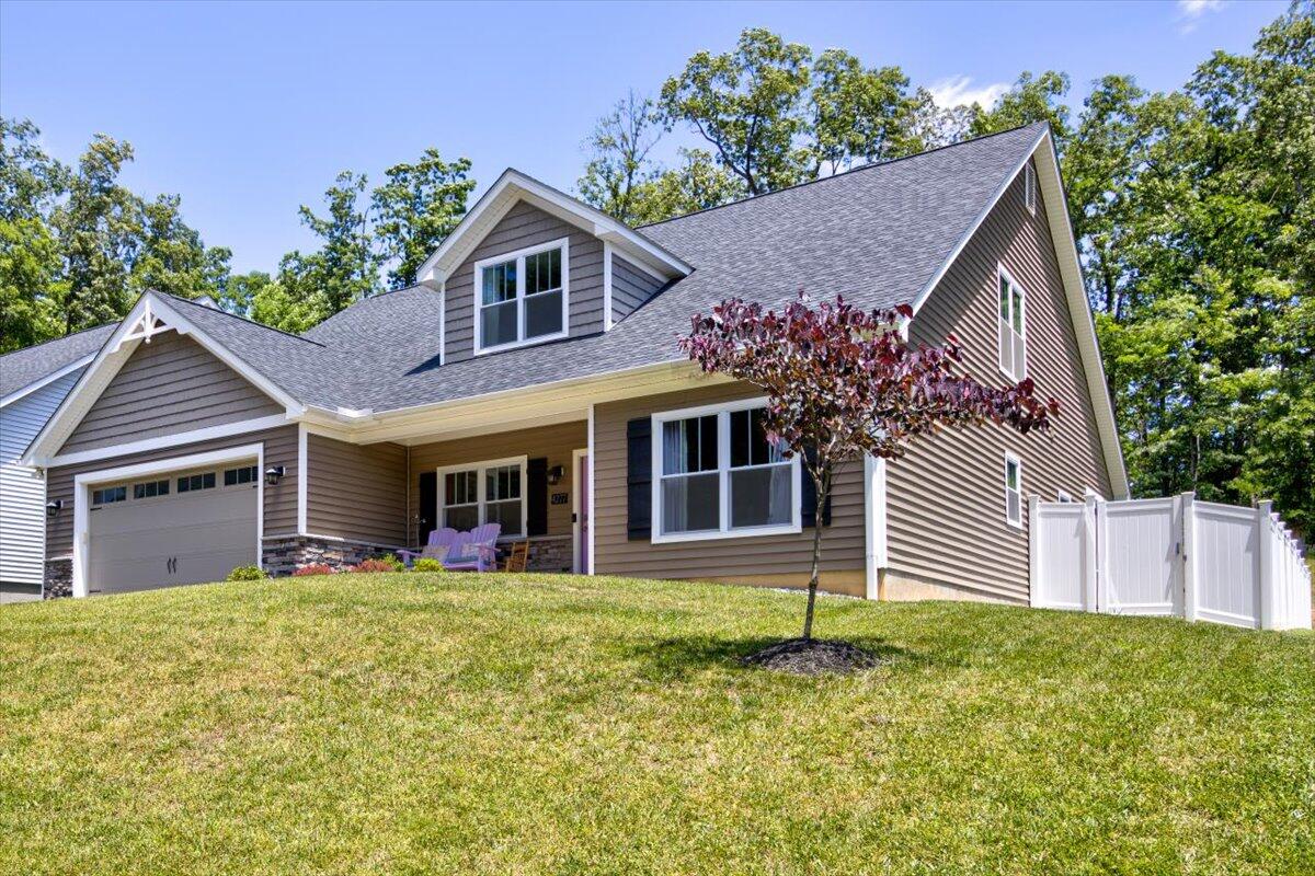 4277 Daugherty Road Salem, VA 24153 - Photo 30 of 48 a front view of a house with a garden and yard