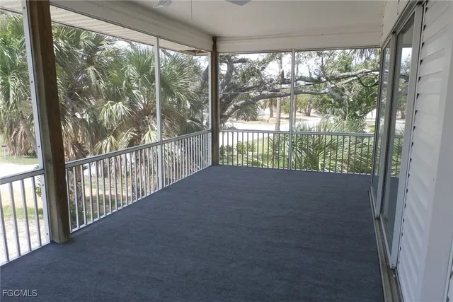 a view of a street view from a balcony