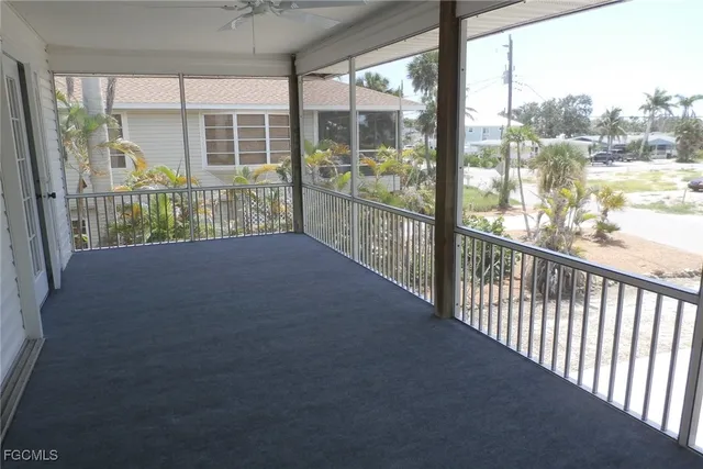 a view of a hallway with windows
