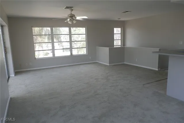 an empty room that has a window