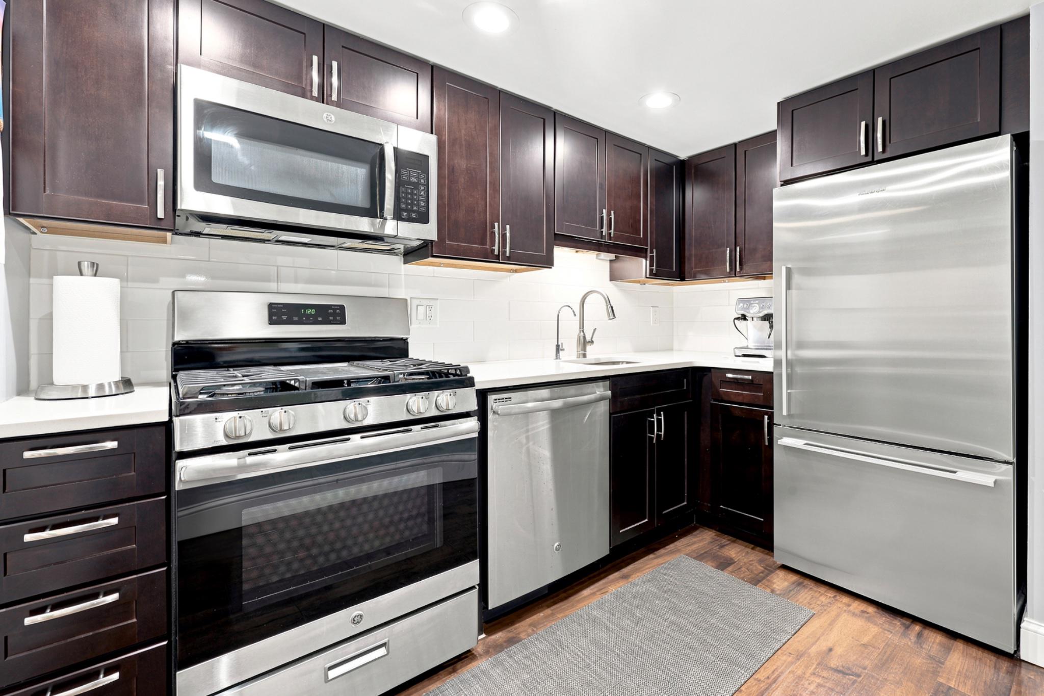 514 Old Forge Crossing Wayne, PA 19087 - Photo 10 of 17 Sleek modern kitchen with stainless steel.