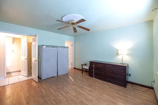 a bathroom with a sink a mirror and a shower