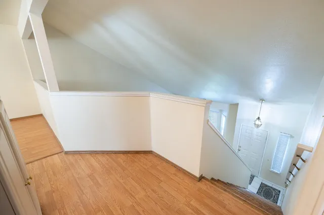 a view of a porch with furniture and garden