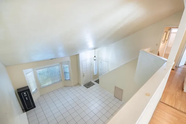 a backyard of a house with lots of green space