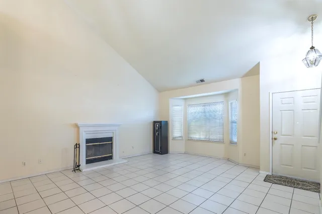 a living room with a fireplace