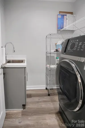 a kitchen with lots of counter top space and dining table