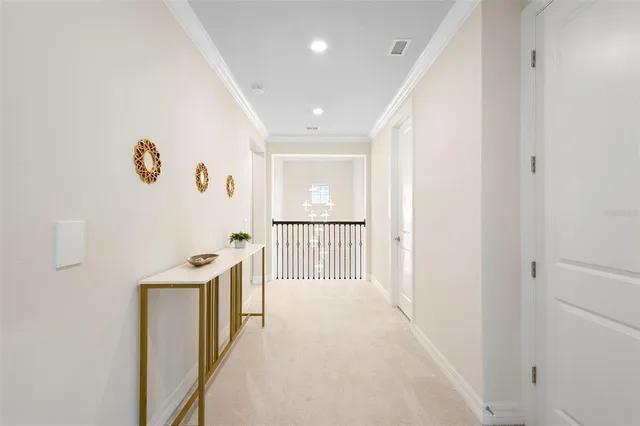 a kitchen with granite countertop white cabinets and sink