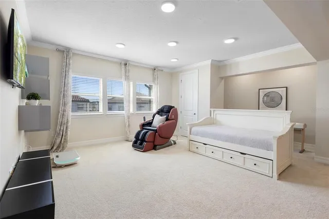 a view of a livingroom with furniture and an porch