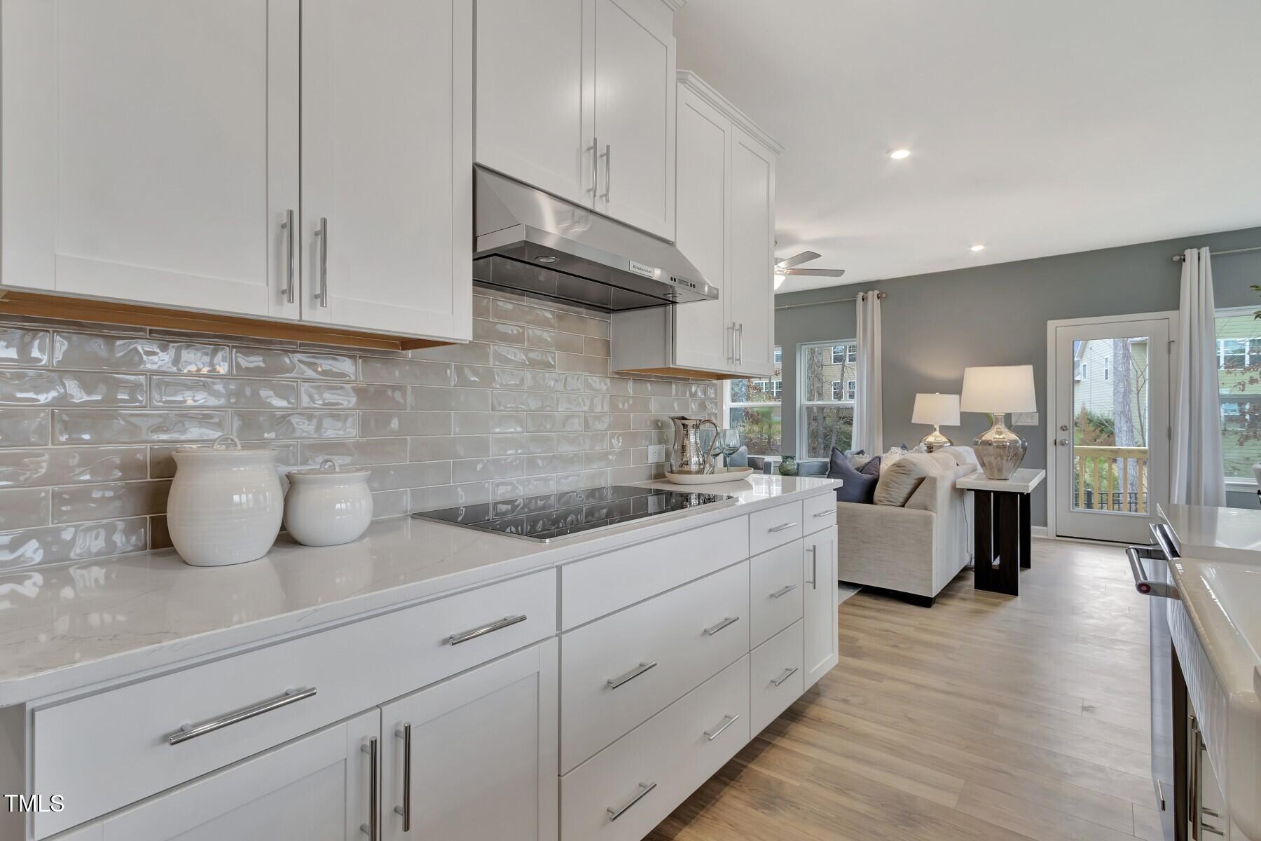 7128 Hubner Place, Unit 35 Cary, NC 27519 - Photo 6 of 17 a kitchen with sink and cabinets