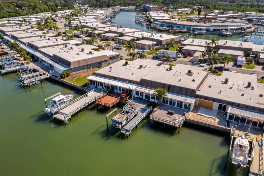 an aerial view of a house with outdoor space swimming pool