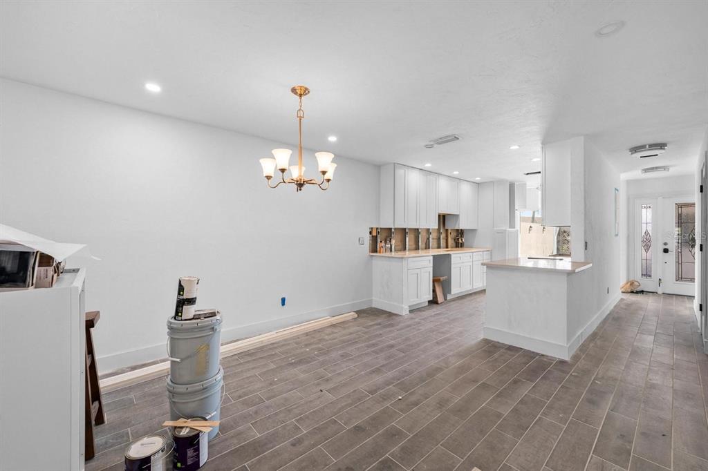 511 Boca Ciega Point Boulevard North St. Petersburg, FL 33708 - Photo 11 of 24 a view of a kitchen with microwave and cabinets