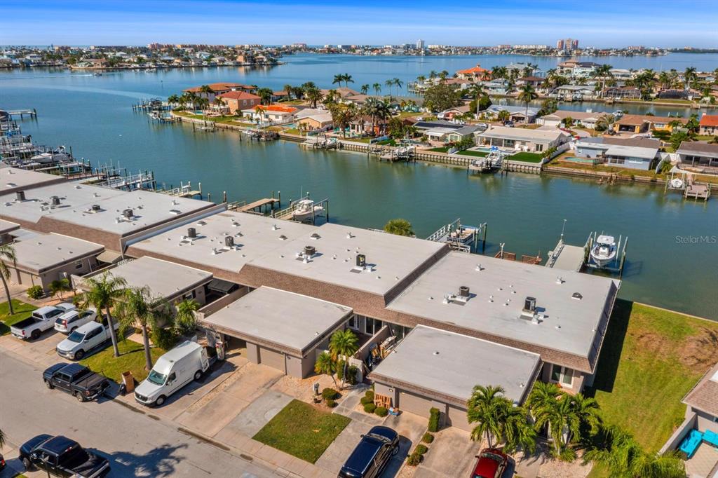 511 Boca Ciega Point Boulevard North St. Petersburg, FL 33708 - Photo 4 of 24 an aerial view of a house with a lake view