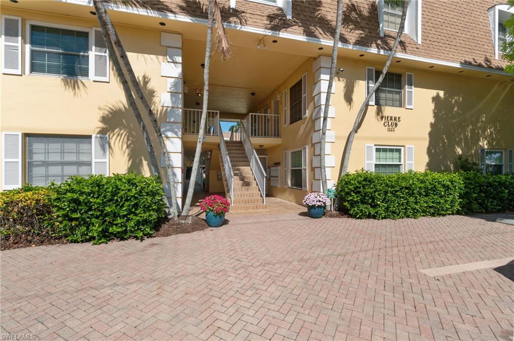1222 Gordon Drive, Unit 2 Naples, FL 34102 - Photo 2 of 23 front view of a house
