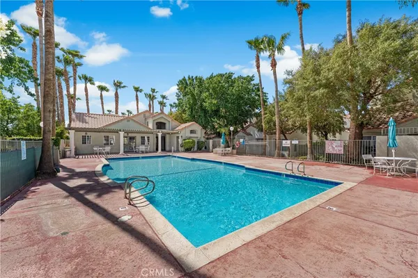 a view of a house with swimming pool