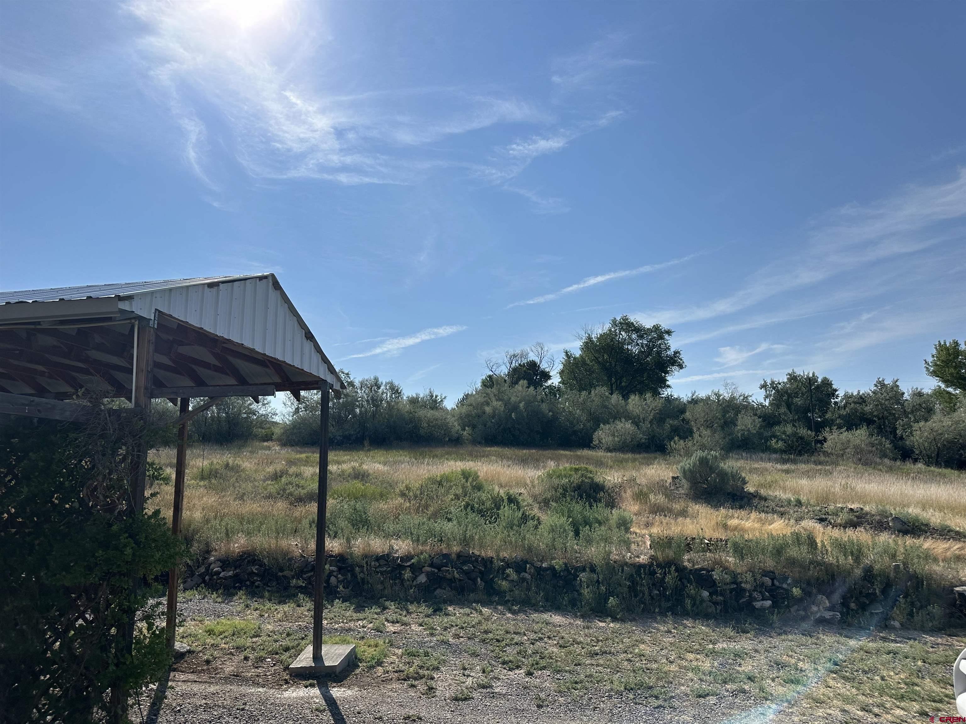 16432 Bull Mesa Road Cedaredge, CO 81413 - Photo 11 of 15 a view of a lake