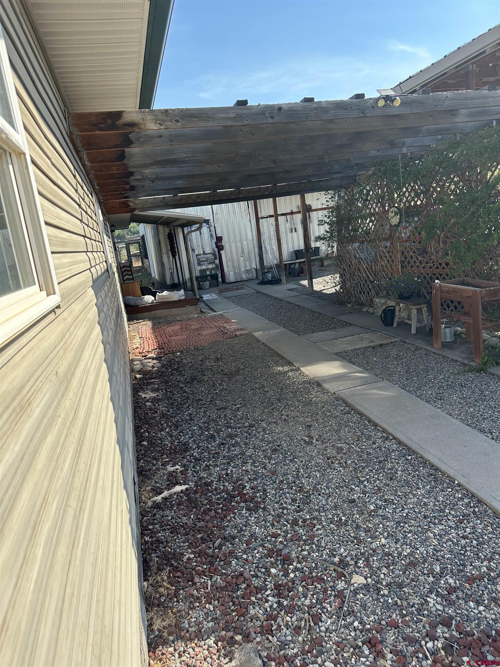 16432 Bull Mesa Road Cedaredge, CO 81413 - Photo 12 of 15 a view of a back yard of the house