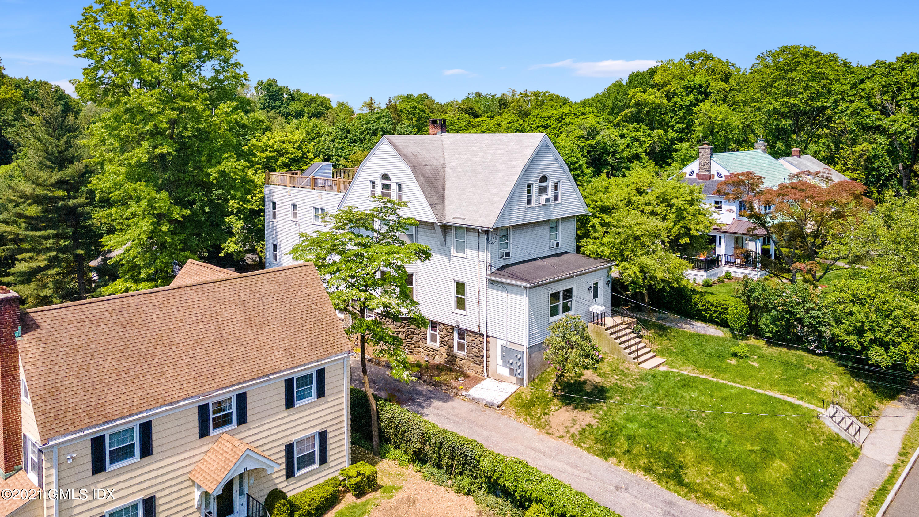 14 Byram Shore Road, Unit 1 Greenwich, CT 06830 - Photo 27 of 30 an aerial view of multiple houses with yard