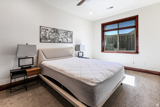 5326 North Oldgate Road Heber City, UT 84032 - Photo 22 of 32 Carpeted room with a dark wood-framed window featuring horizontal blinds
