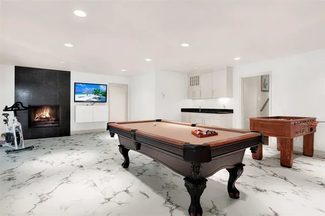 a dining room with a table and chairs