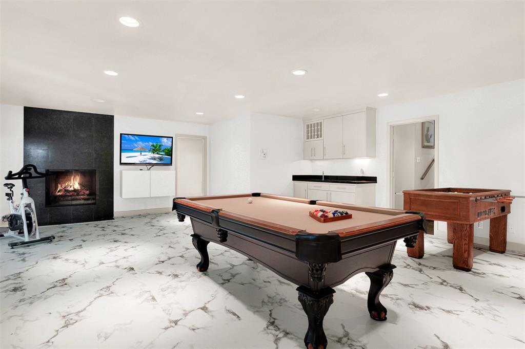 13311 Purple Sage Road Dallas, TX 75240 - Photo 12 of 31 a dining room with a table and chairs