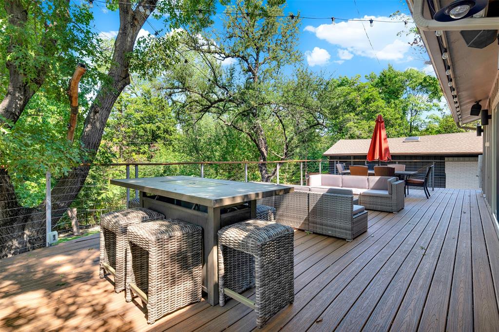 13311 Purple Sage Road Dallas, TX 75240 - Photo 12 of 26 a backyard of a house with seating space